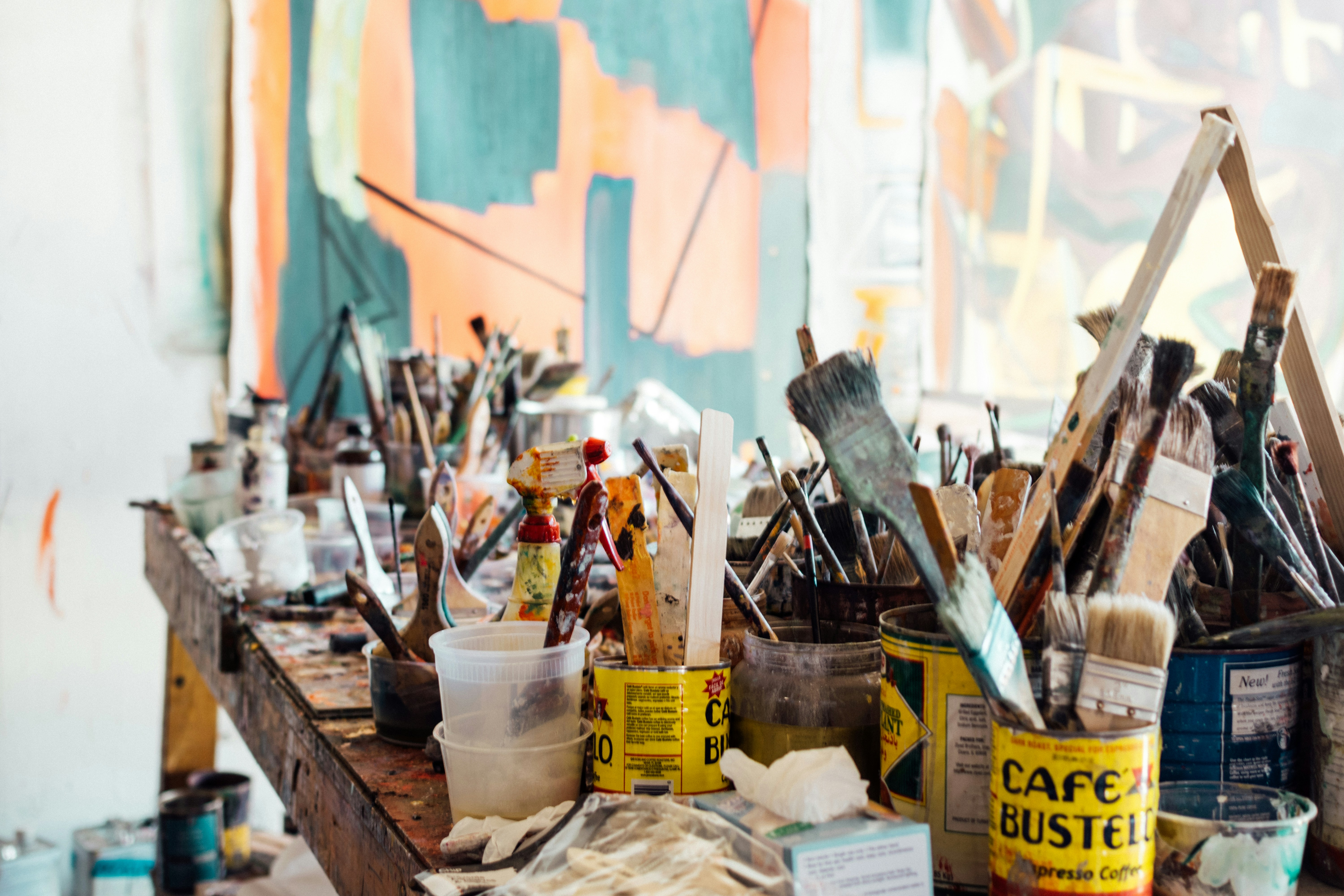 Artist studio with paint brushes and vibrant canvases in Napa Valley